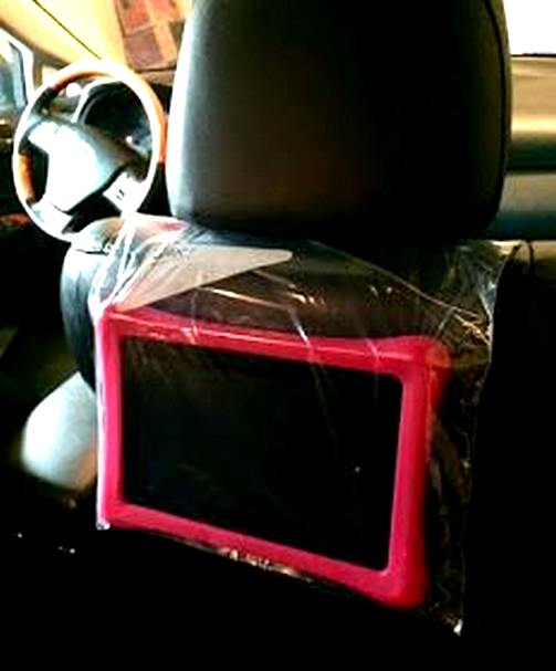 Plastic bag as smartphone, tablet holder in car